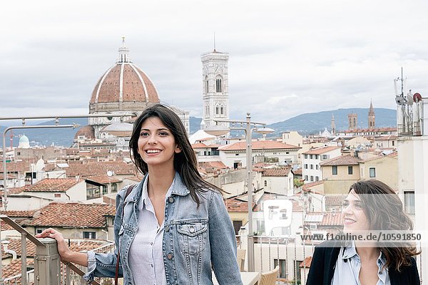 Lesbian couple in front of Giotto's Campanile and Florence Cathedral  Tuscany  Italy