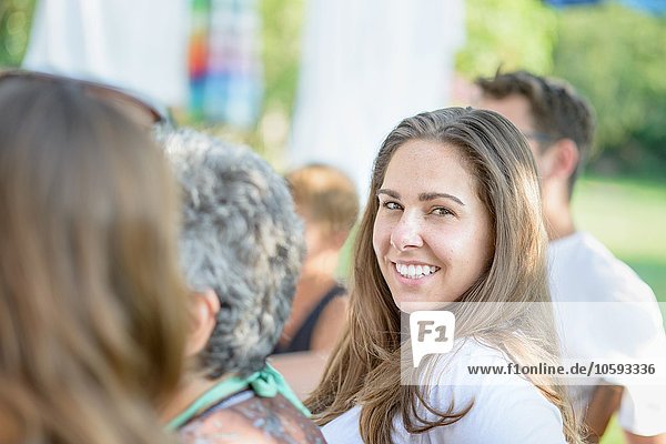 Woman smiling at tomato eating festival