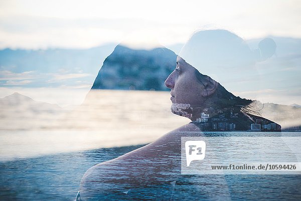 Doppelte Belichtung der Frau mit Blick auf den Luganer See  Schweiz
