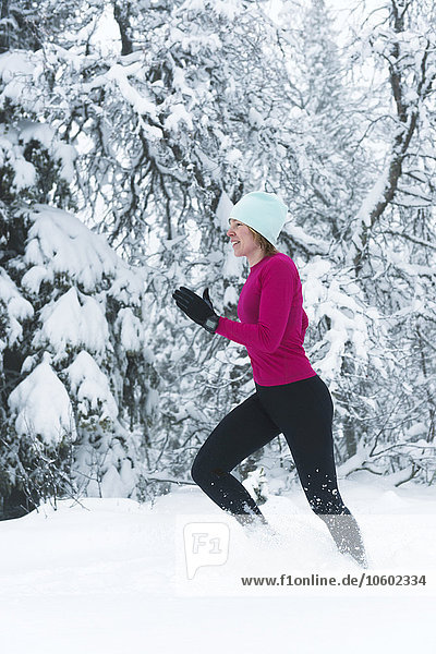 Woman running at winter  Sweden