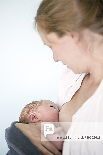 Mother breastfeeding newborn baby  Danderyd  Stockholm  Sweden