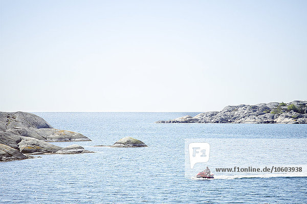 Person on jet ski at sea