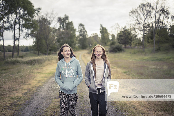 Teenage girls walking together