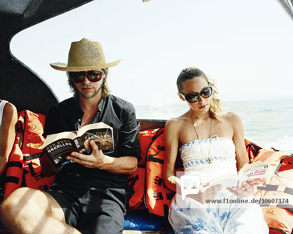 A Scandinavian couple on a boat trip.