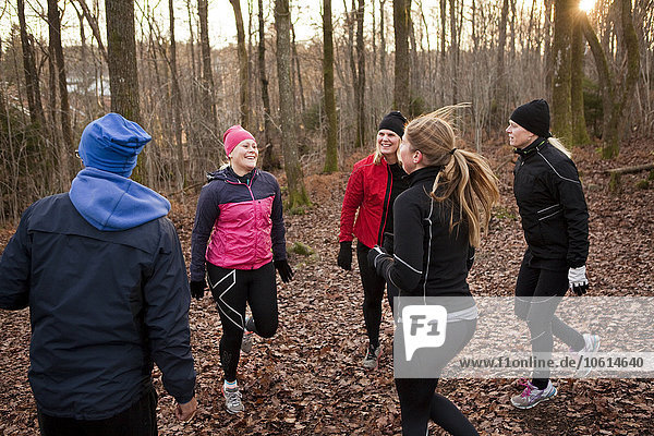 Women training in forest