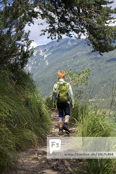 Austria  Tyrol  boy hiking at Achensee