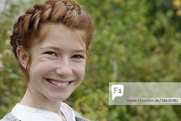 Germany  Bavaria  redheaded girl  plaited hair