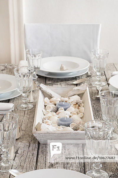 Maritime laid table with wine glasses