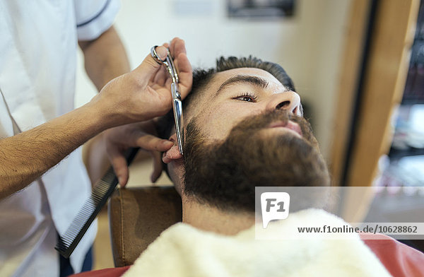Friseur Bart eines Kunden