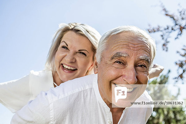 Portrait of happy elderly couple outdoors