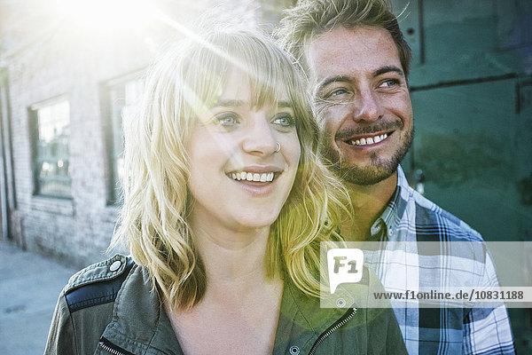 Caucasian couple smiling outdoors