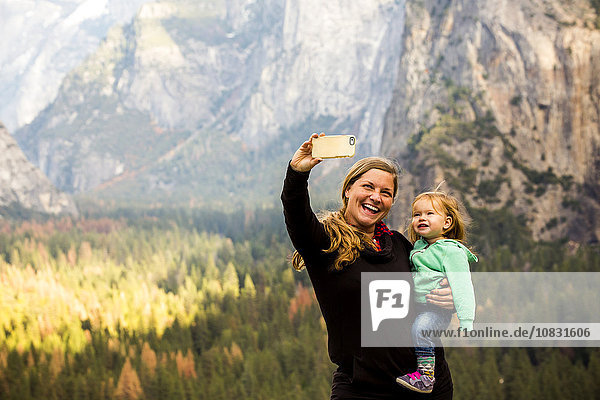 Caucasian mother and daughter in Yosemite National Park  California  United States