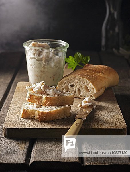 Homemade lard on baguette bread and in a glass