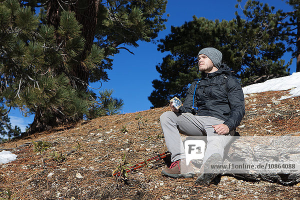 Hiker taking break  Mount Baldy  California