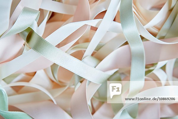 Overhead view of pastel colour ribbons