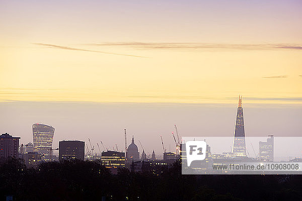 UK  London  skyline with 20 Fenchurch Street  St Paul's Cathedral and The Shard at dawn