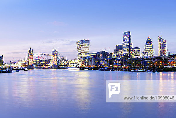 UK  London  skyline with River Thames and Tower Bridge at blue hour