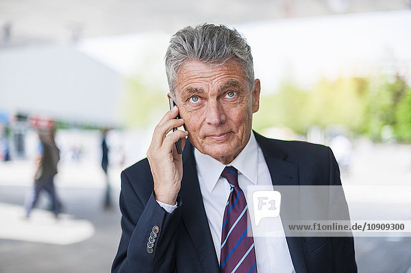 Senior businessman on cell phone