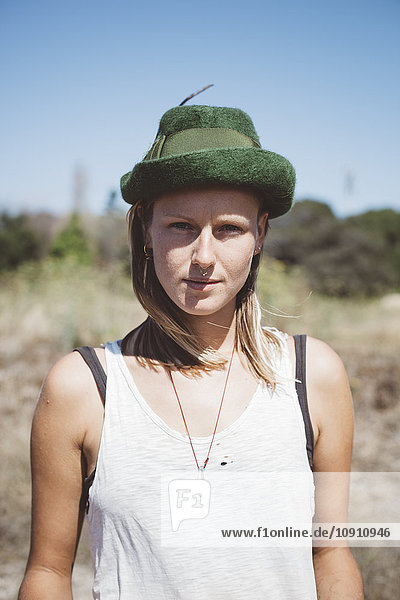 Portrait of hippie wearing hat