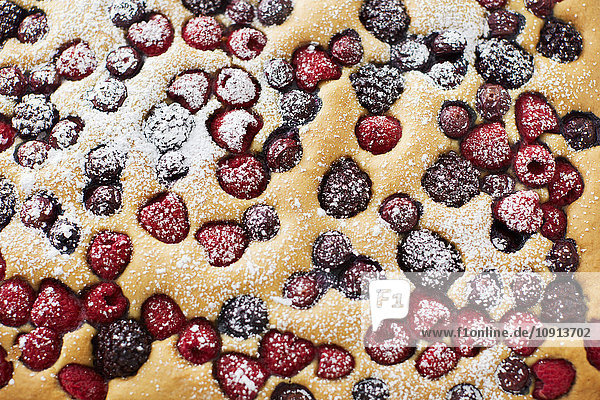 Fruit cake with different berries  close-up