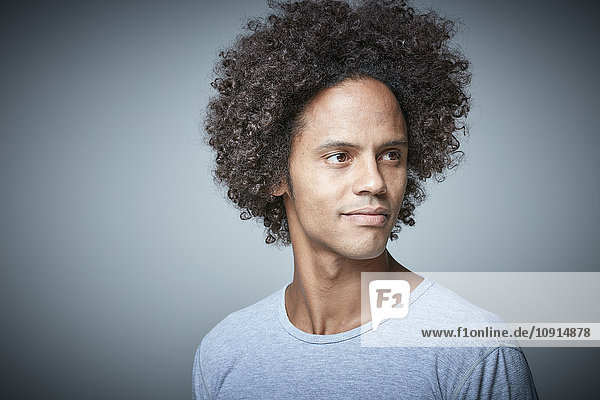 Portrait of relaxed man with afro