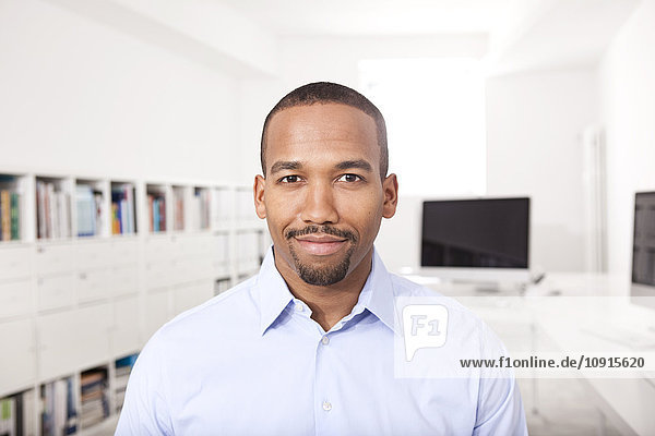 Portrait of smiling businessman in the office