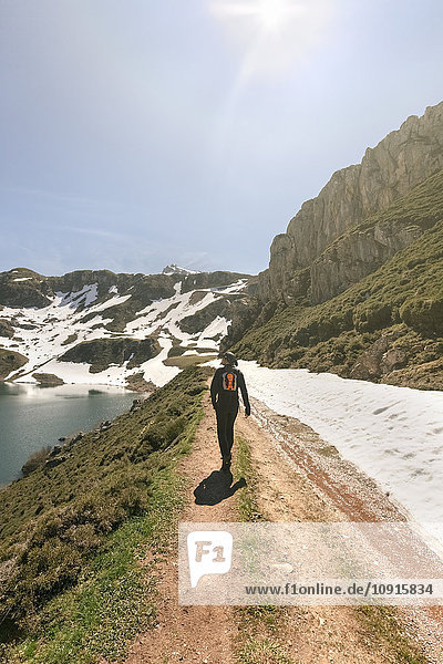 Spain  Asturias  Somiedo  man hiking in mountains