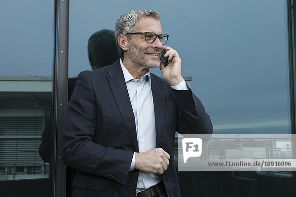 Successful businessman talking on the phone