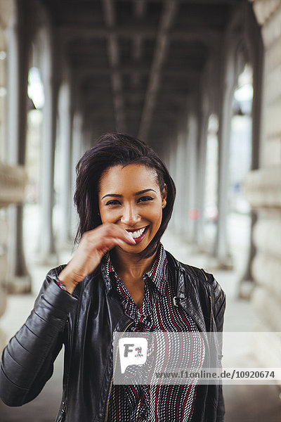 France  Paris  portrait of smiling young woman