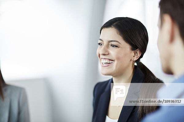 Enthusiastic businesswoman in meeting