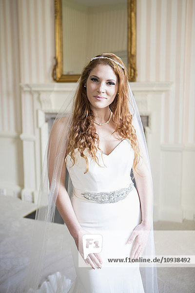 Bride showing off wedding dress