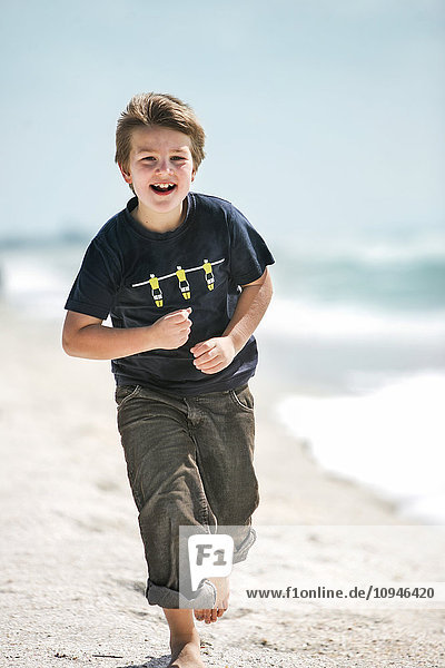 Smiling boy on beach