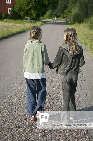 Two girls walking together