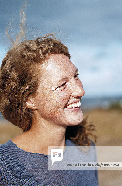 Laughing redhead woman