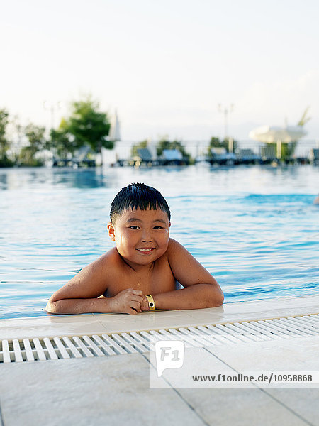 Portrait of a boy in a swimming-pool  Turkey.