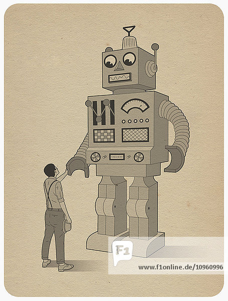 Mann schüttelt einem großen Roboter die Hand