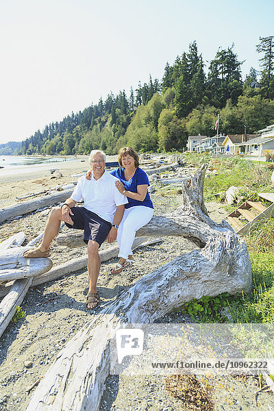'Portrait of a couple on a beach; Whidbey Island  Washington  United States of America'