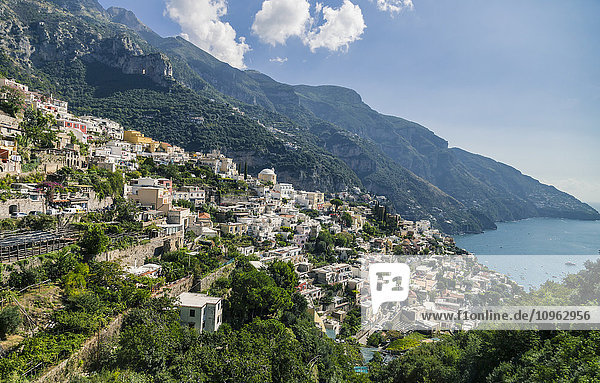 'The town of Positano on the scenic Amalfi Coast drive in Italy showing the Meditteranean Sea and historic mountainous villages and old world architecture; Positano  Campania  Province of Salerno  Italy'