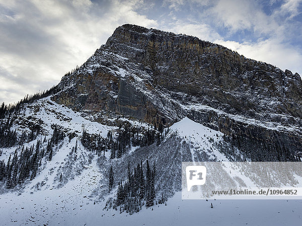 'Rugged mountain with snow in winter; Lake Louise  Alberta  Canada'