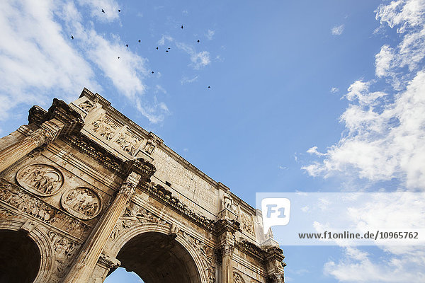 'Low angle view of ornate wall of the Arch of Constantine; Rome  Italy'