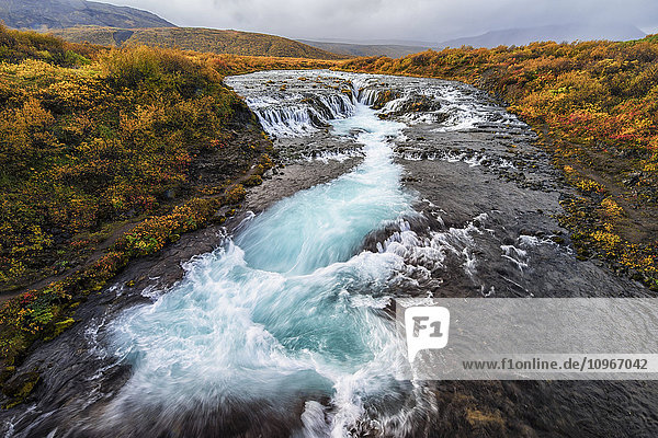 'Waterfall and flowing water in a river; Bruarfoss Iceland'
