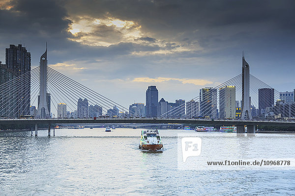 'Dinner cruise along Pearl River enjoying Guangzhou skyline; Guangzhou  China'