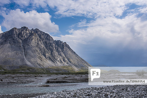 Dramatic skies along the Marsh Fork of the Canning river in the Arctic National Wildlife Refuge  summer  Alaska