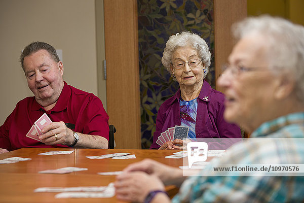 'Senior citizens enjoying life in their shared residence; Edmonton  Alberta  Canada'