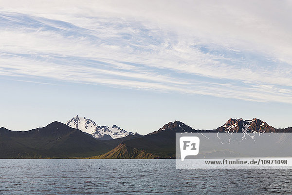'Frosty Volcano Near Cold Bay On The Alaska Peninsula; Southwest Alaska  United States Of America'