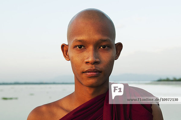 'Portrait of a young buddhist monk; Mandalay  Myanmar'