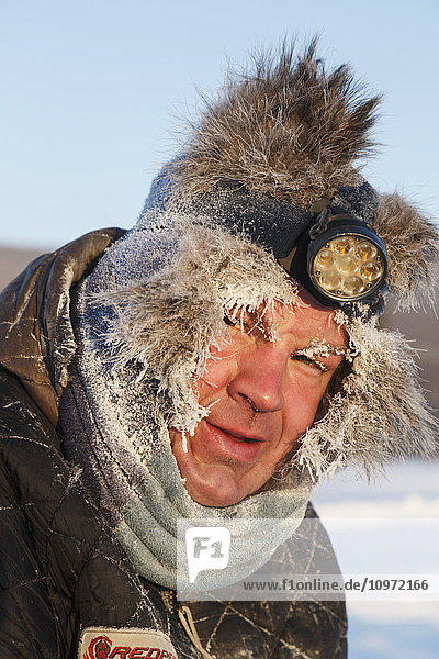 Portrait of Ken Anderson at sunrise  Manley Hot Springs Checkpoint  2015 Iditarod