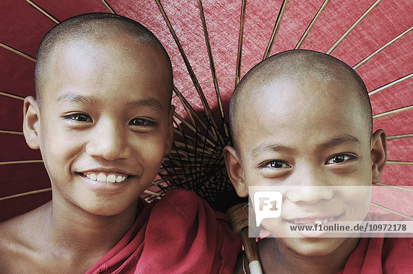 'Portrait of two novice buddhist monks; Myanmar'