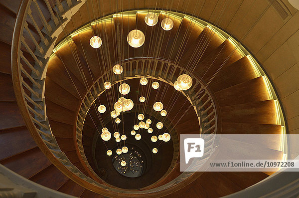 'Spiral staircase with lights at Heal's department store  Tottenham Court Road; London  England'