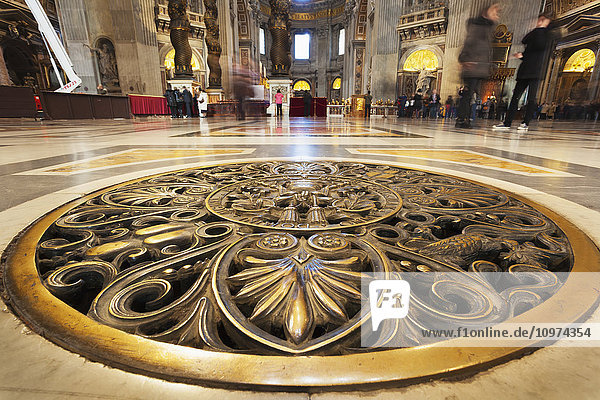 'Decorative metal gold floor cover  St. Peter's Basilica; Rome  Italy'